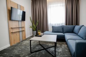 TV a/nebo společenská místnost v ubytování Hotel Tomas