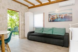 Posezení v ubytování Apartment Oli