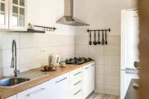 Kuchyň nebo kuchyňský kout v ubytování Apartment Oli