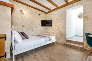 Postel nebo postele na pokoji v ubytování Apartment Oli