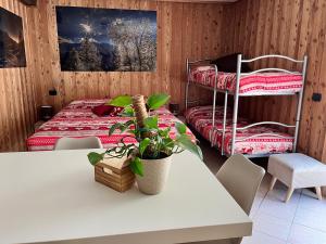 Кровать или кровати в номере Residenze Vezza - La Corteccia-