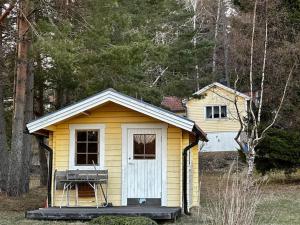 Photo de la galerie de l'établissement Spillersboda stuga med båtar, à Spillersboda