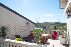 Balkón nebo terasa v ubytování I Leoni Ruggenti Terrazza Incantata tra le Colline del Monferrato