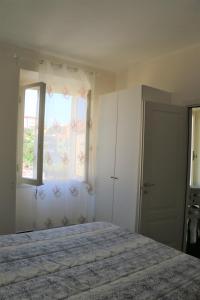 Postel nebo postele na pokoji v ubytování Affittacamere DA MARIA TERESA + 10 fotografií