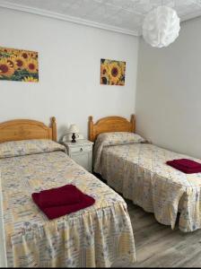Postel nebo postele na pokoji v ubytování Piso Los Jardines