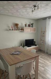 a dining room with a table and chairs at Piso Los Jardines in Peñaranda de Bracamonte +27 photos