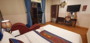 Postel nebo postele na pokoji v ubytování Milan Diamond Hotel