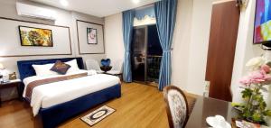 Postel nebo postele na pokoji v ubytování Milan Diamond Hotel