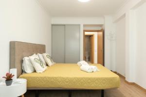 Giường trong phòng chung tại Miral Beachside 2 - by HD Properties