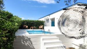 Бассейн в Pool Seaside Relais - VILLE Ninfea, Marea, Rosa e Cassiopea или поблизости