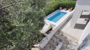 Бассейн в Pool Seaside Relais - VILLE Ninfea, Marea, Rosa e Cassiopea или поблизости