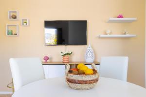 TV a/nebo společenská místnost v ubytování Civico 36 - Pescoluse