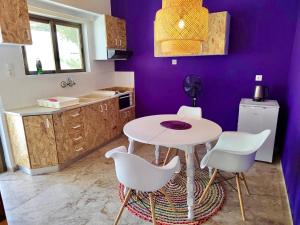 A kitchen or kitchenette at The Beachhouse Apartments