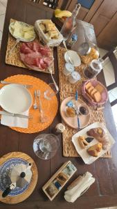 Hommikusöögi valikud saadaval majutusasutuse La mansarda di Daniela külastajatele