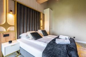 Góralski Resort Pool & SPA客房内的一张或多张床位