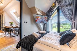 Góralski Resort Pool & SPA客房内的一张或多张床位