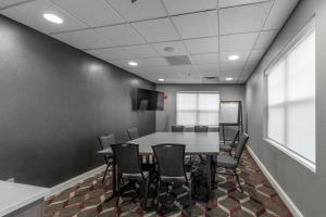 a conference room with a table and chairs at Residence Inn Columbus Easton in Columbus