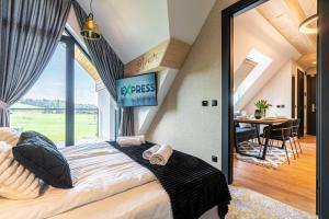 Góralski Resort Pool & SPA客房内的一张或多张床位