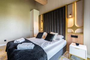 Góralski Resort Pool & SPA客房内的一张或多张床位