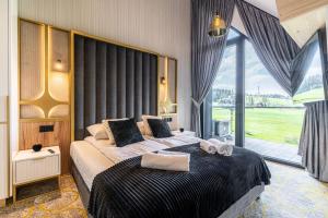 Góralski Resort Pool & SPA客房内的一张或多张床位