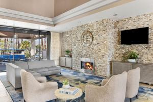 a living room with a couch and a fireplace at Marriott's Desert Springs Villas II in Palm Desert