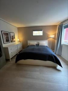 Cama o camas de una habitación en Ross-Smauet Apartment - Charming Bergen House Constructed in 1880