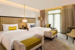 Voodi või voodid majutusasutuse The Alexander, a Luxury Collection Hotel, Yerevan toas
