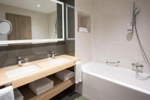 Ванная комната в Sheraton Dubrovnik Riviera Hotel