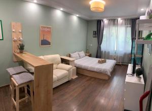 a small room with a bed and a couch at Exceptional Refurnished Studio TOP Location in Sofia