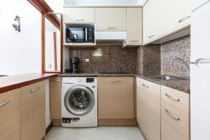 Kuchyň nebo kuchyňský kout v ubytování UHC Novelty Apartments
