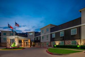 a rendering of the front of a hotel at Four Points by Sheraton Dallas Arlington Entertainment District in Arlington