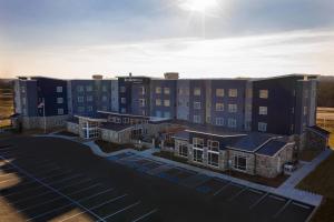 an aerial view of a hotel with solar panels at Residence Inn by Marriott Louisville Old Henry in Louisville