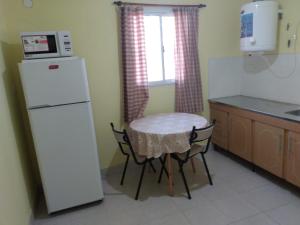 Kuchyň nebo kuchyňský kout v ubytování MARGARITA ALOJAMIENTO TEMPORARIO