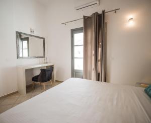 Letto o letti in una camera di Anthemis Suites