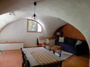 Postel nebo postele na pokoji v ubytování Les Voûtes du Chambon
