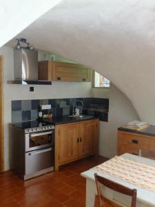 Dapur atau dapur kecil di Les Voûtes du Chambon +10 gambar
