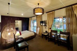 Postel nebo postele na pokoji v ubytování Protea Hotel by Marriott Zambezi River Lodge + 30 fotografií