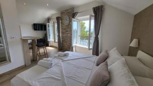 Posteľ alebo postele v izbe v ubytovaní Old Town Sea Front M&M Apartment Korčula