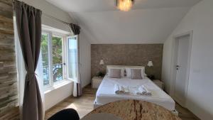 Posteľ alebo postele v izbe v ubytovaní Old Town Sea Front M&M Apartment Korčula