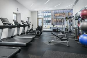 a gym with treadmills and elliptical machines at Residence Inn New York Downtown Manhattan/Financial District in New York