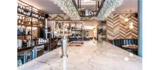 a bar with a marble counter in a restaurant at Rooms Above Sugar Boat in Helensburgh