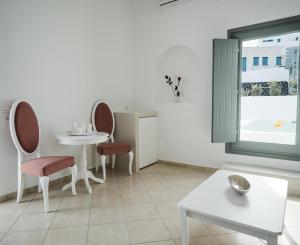 Area soggiorno di Anthemis Suites
