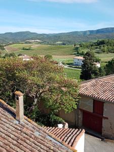 a view of the countryside from the roof of a house at Le passage de Gardie 