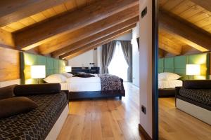 Postel nebo postele na pokoji v ubytování Hotel Vedig