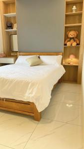 Cama o camas de una habitación en 聚一夏民宿