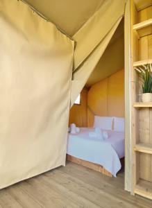 Postel nebo postele na pokoji v ubytování Mareleon Camping