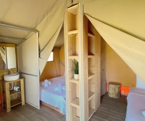 Postel nebo postele na pokoji v ubytování Mareleon Camping