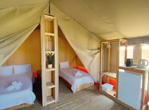 Postel nebo postele na pokoji v ubytování Mareleon Camping