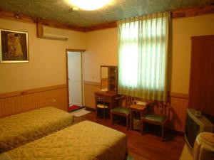 Letto o letti in una camera di Donglifang B&B