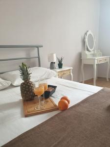 Postel nebo postele na pokoji v ubytování Family & friends Maisonette in the center of Lixouri